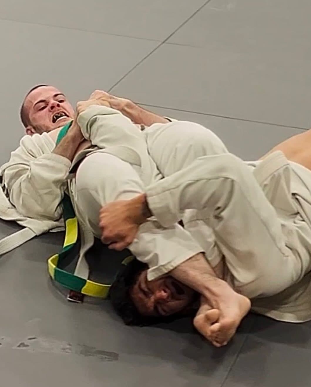 Young student securing an armbar